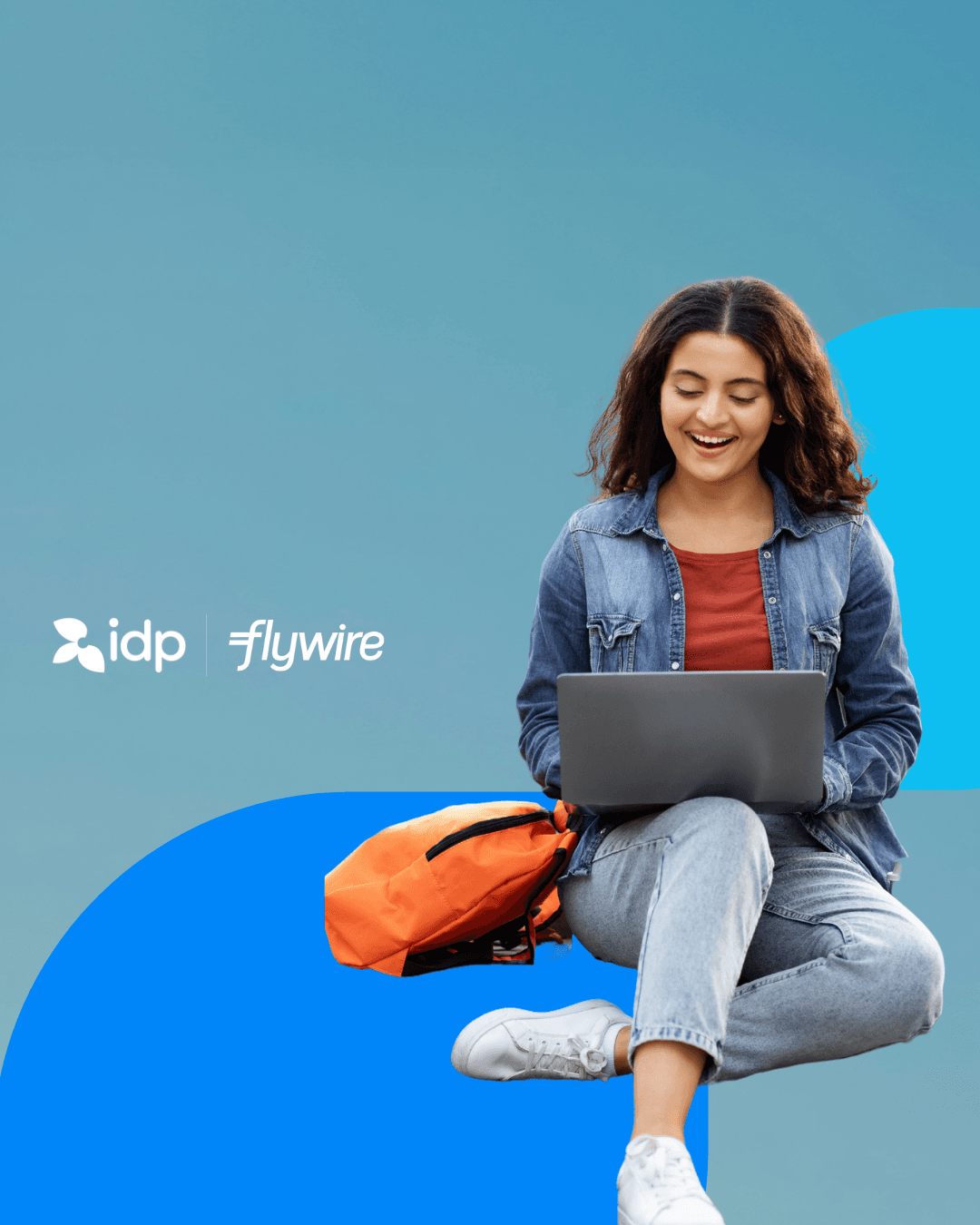 A young woman smiles while using a laptop, sitting cross-legged with an orange backpack. The background is blue with the logos for idp and flywire displayed beside her.