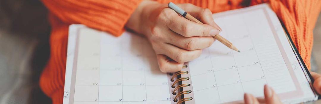 writing on a planner