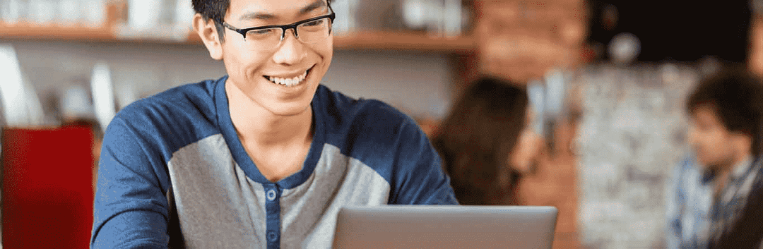 student with a laptop
