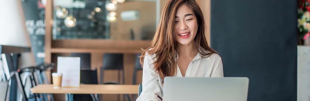 a women looking at her laptop