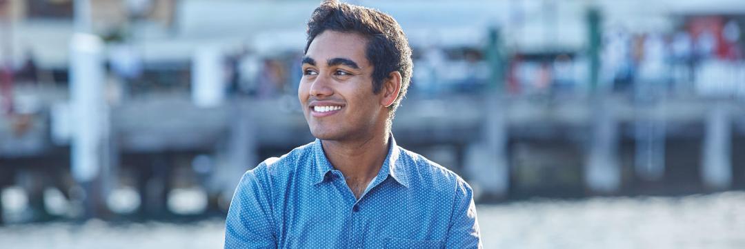 A male student smiling