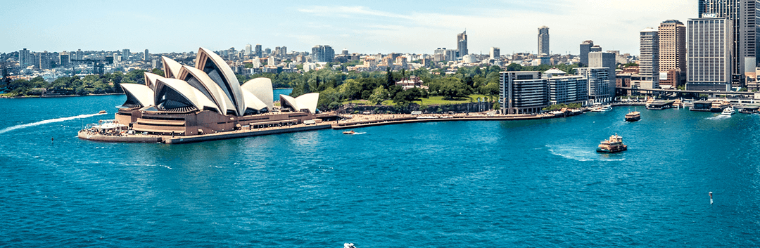 An aerial view of Sydney city along with the Opera House